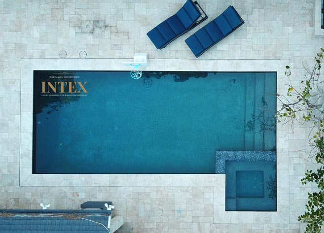 Aerial view of rectangular pool with spa